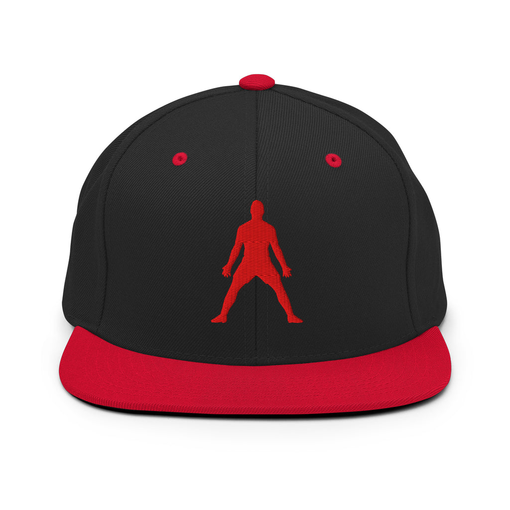 Black snapback hat with red 3D puff silhouette logo and red side eyelets, flat brim.