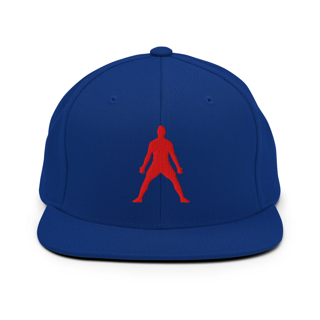 Royal blue snapback hat with red 3D puff silhouette logo embroidery, flat brim, button top.