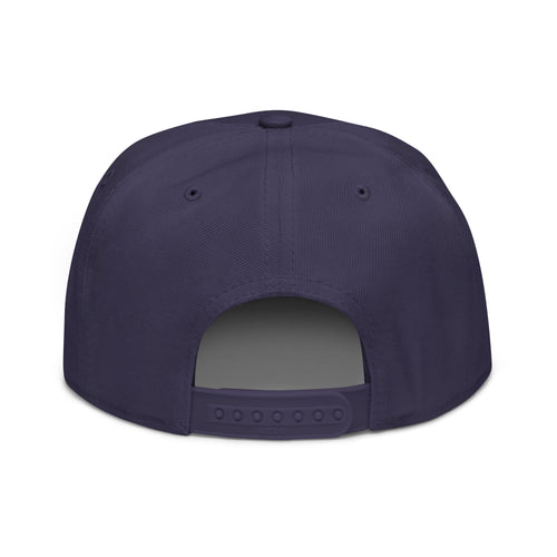 Navy snapback hat back view with adjustable plastic strap at the brim